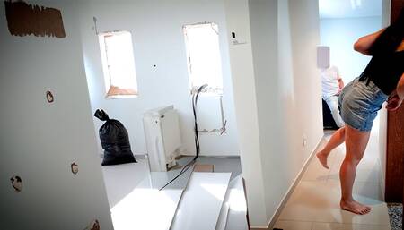 Naughty housewife fucks with the architect working at her house.