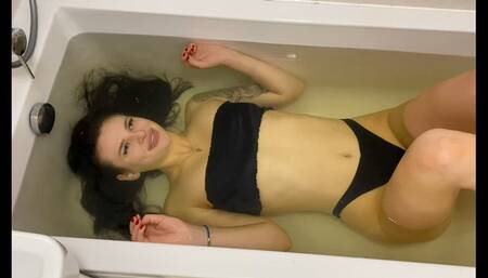 Mermaid Jade blows bubbles and smiles underwater without a nose clip