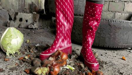 Jeannette destroys vegetables in red rubber bootsWMV