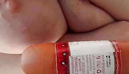 A sausage between the tits
