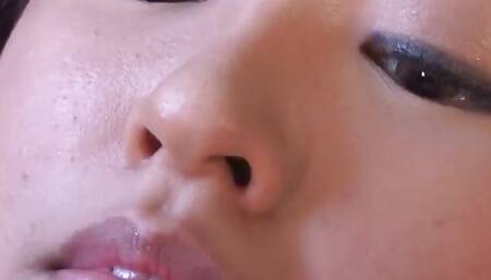 Aoi gives a deepthroat job to an Asian guy while wearing stockings, featured in a porn movie with the label JAV XXX.
