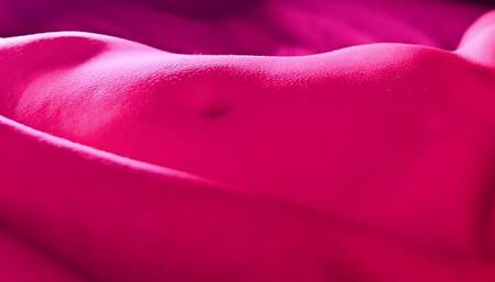 The teenager masturbates on his bed to Neon