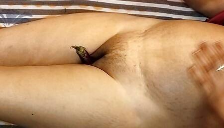 Bhabhi Madhu calming the heat of the with eggplant