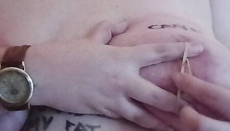Rubber band fun on my nipples and clit