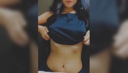 Hot Indian college girl showing her pink pussy and Fingering in it