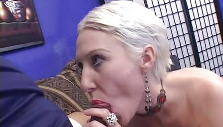 Hot blonde MILF masturbates with a toy then gets double penetrated by two hunks