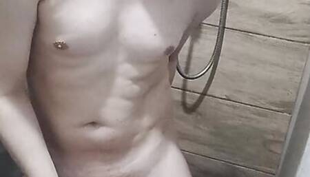 Cute guy plays with his in the shower and cums