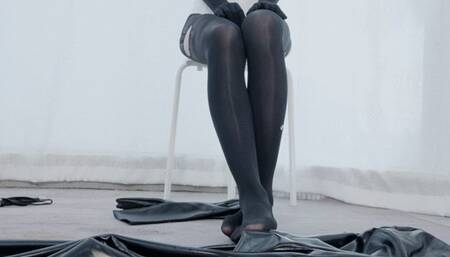 Asian pvc fetish girl show her foot, body, gloves and boots