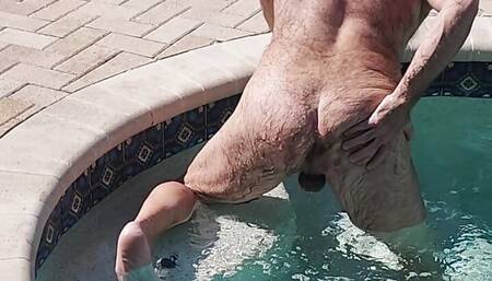 Soaking wet hairy man strips off his swimsuit and cums hard!