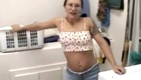 A filthy brunette with glasses is giving a small dick a blowjob