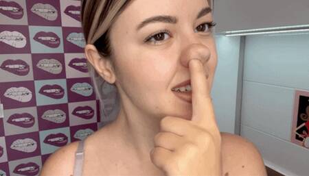 sexy blonde picking her nose