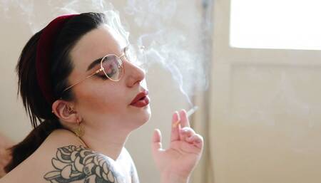 Naked Tattooed Model Smokes Camel s100 cigarette