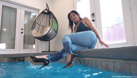 Reyna swimming in the Pool wearing Jeans, Heels and a Swimsuit