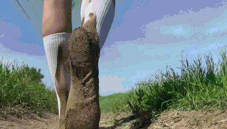 The Unconventional Journey: Jeannette's Stroll in Sandals and Golf SockSD