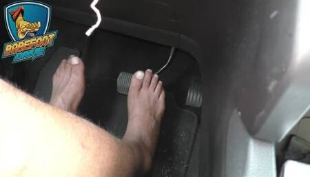 Alec drives barefoot