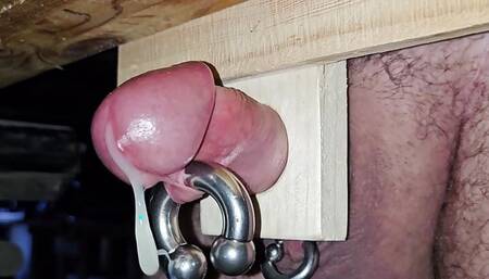 Cock stuck in a piece of wood and cummed