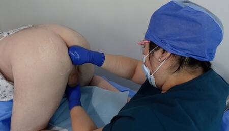 Doctor performs surgical medfet prostate milking  while patient is on all fours