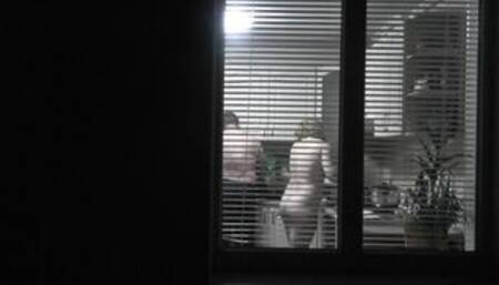 Family nudism . Naked stepdaughter cooking dinner walks naked in front of Dad at open window public