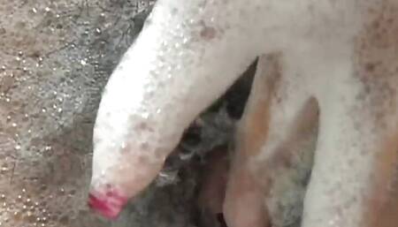 Andrea Kelly a slut with a hairy pussy stimulates her clit