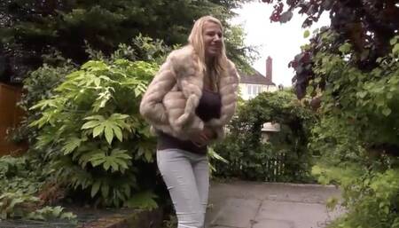 Danielle Maye wets her jeans in the garden
