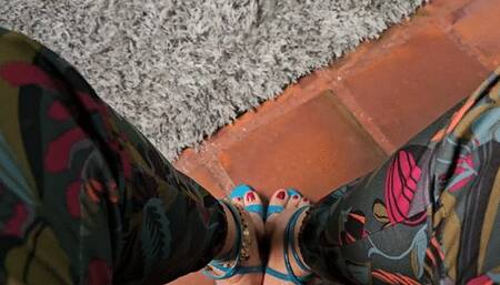 Milah Arches tantalizing dangling on sexy blue sandals