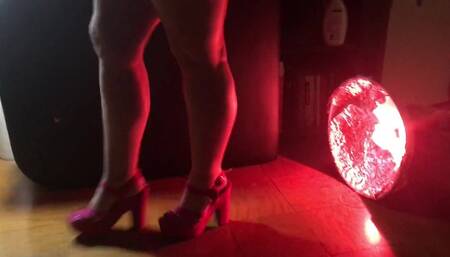 Pink heels, feather drop...