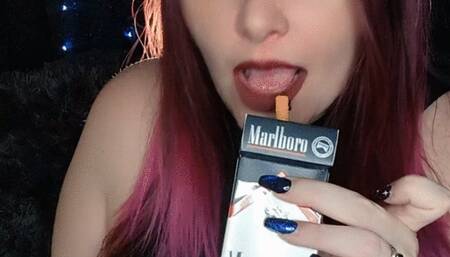 Smoking a Marlboro100 in a slutty dress
