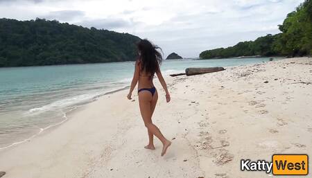 Katty Shows off Her Charms and Pisses on a White Sandy Beach