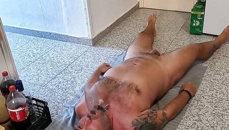 Husband Lying on His Back Drinking Piss & Cum Through a Funnel