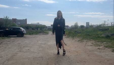 girl in high heels found a mattress and wants to tear it up with her heels, changing her shoes for thisG