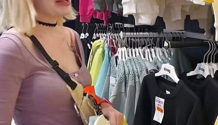 Gf gives a blowjob in the changing booth