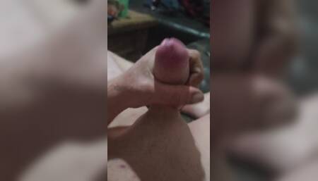 Masturbating