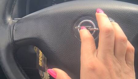 asmr nails tapping on the steering wheel