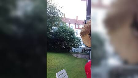 Sissy smoking in the garden
