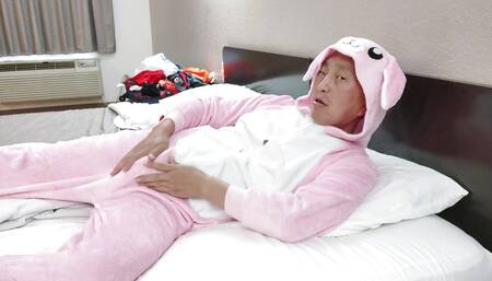 Hot Asian posing in my new pink onesie and zippered black boxer briefs in cheap motel