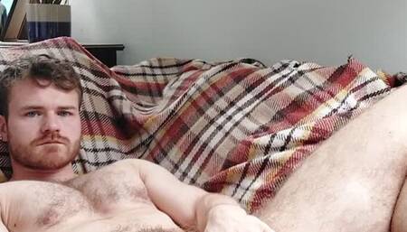 FTM lying back and fingering his pussy
