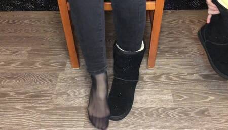 Student girl show nylon socks, boots and foot after study