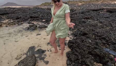 Desperate girl’s pee into the water outdoors