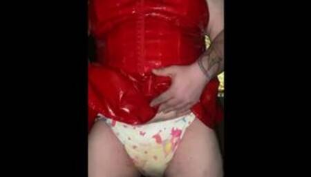 Diaper girl  in red latex outfit