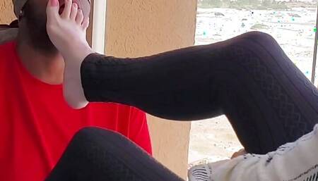 Worshiping mature lady feet while neighbors watch on balcony