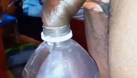 Pissing in a Large Juice Container