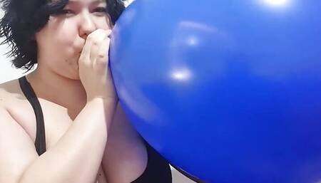 Blowing up HUGE blue balloon