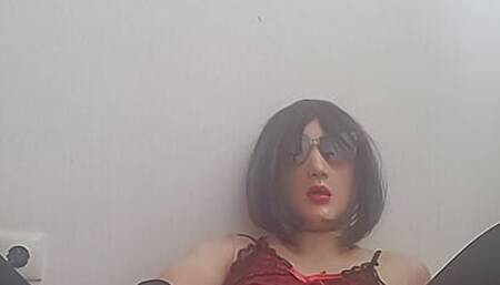 Sissy in stocking plays with toy