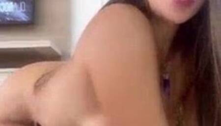 Big tits latina rubs her pussy