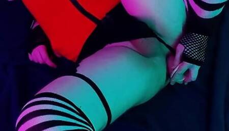 Slut fucks her tight hole with a large dildo