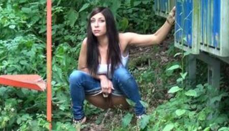 Smoking Babe Pees In Public At The Bus Stop