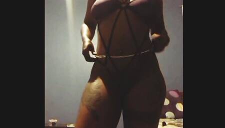 Busty ebony milf flashing tits and ass