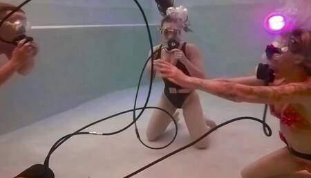 Hot chicks with a guy in the pool