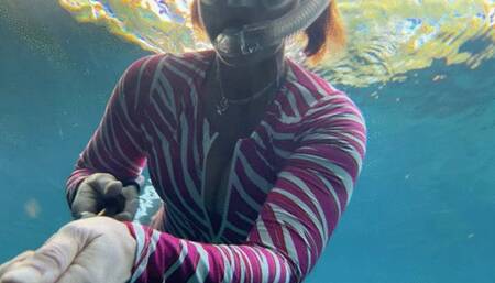 Zebra dive suit in the spring with deep cleavage view and legs on display part two