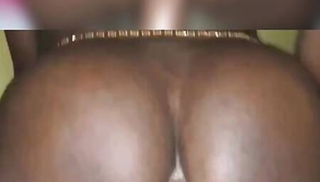 Black femboy riding a dildo